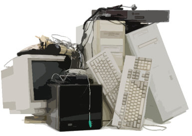 Old computer equipment in a messy pile.